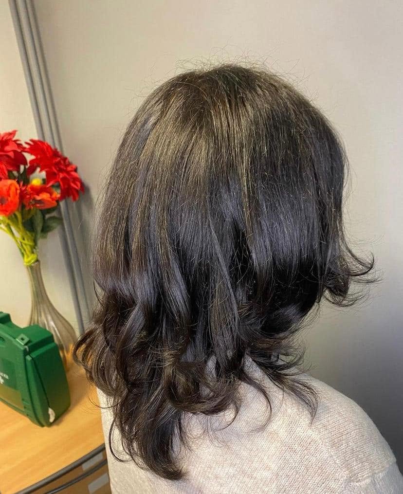 Soft brunette waves after a cut and blow dry